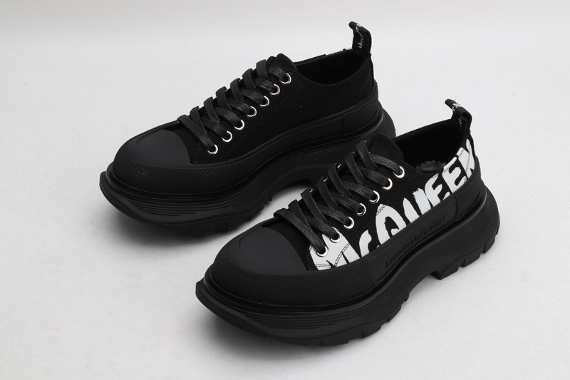alex mcq tread slick lace up in black with letters