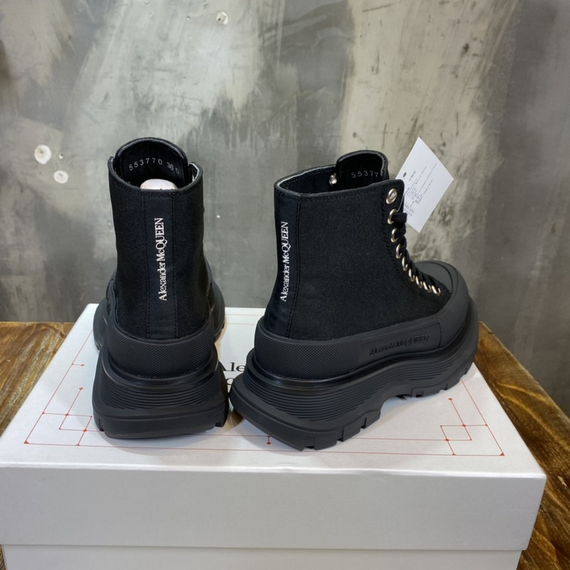 alex mcq tread slick boot in black