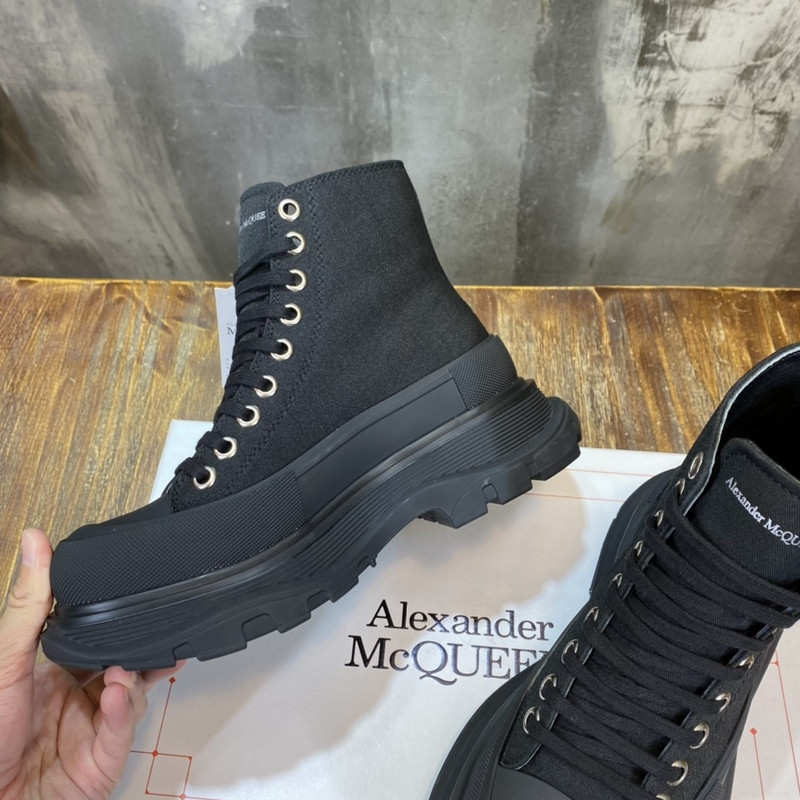 alex mcq tread slick boot in black