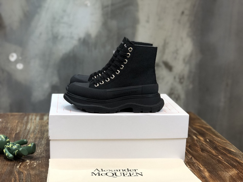 alex mcq tread slick boot in black