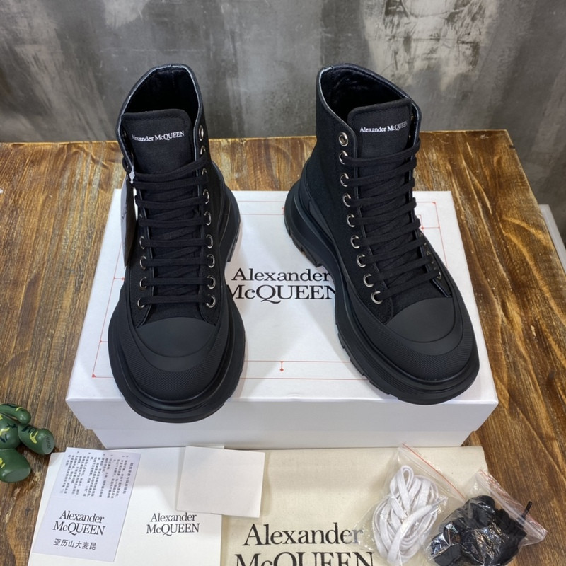 alex mcq tread slick boot in black