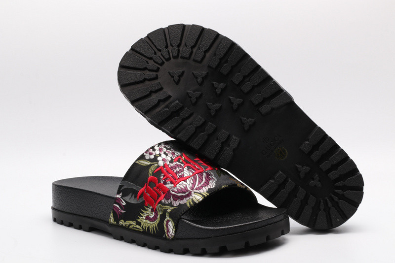 G*u*i slides all black with flower