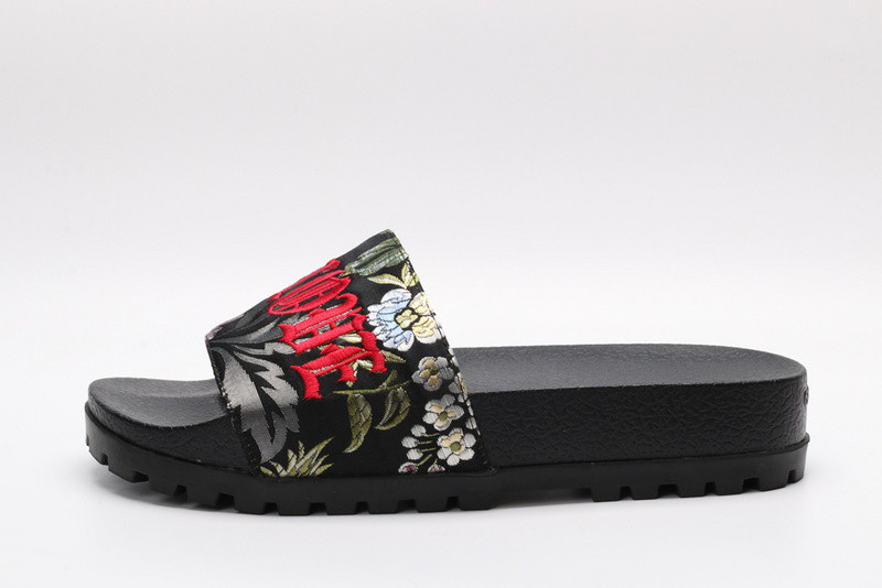 G*u*i slides all black with flower