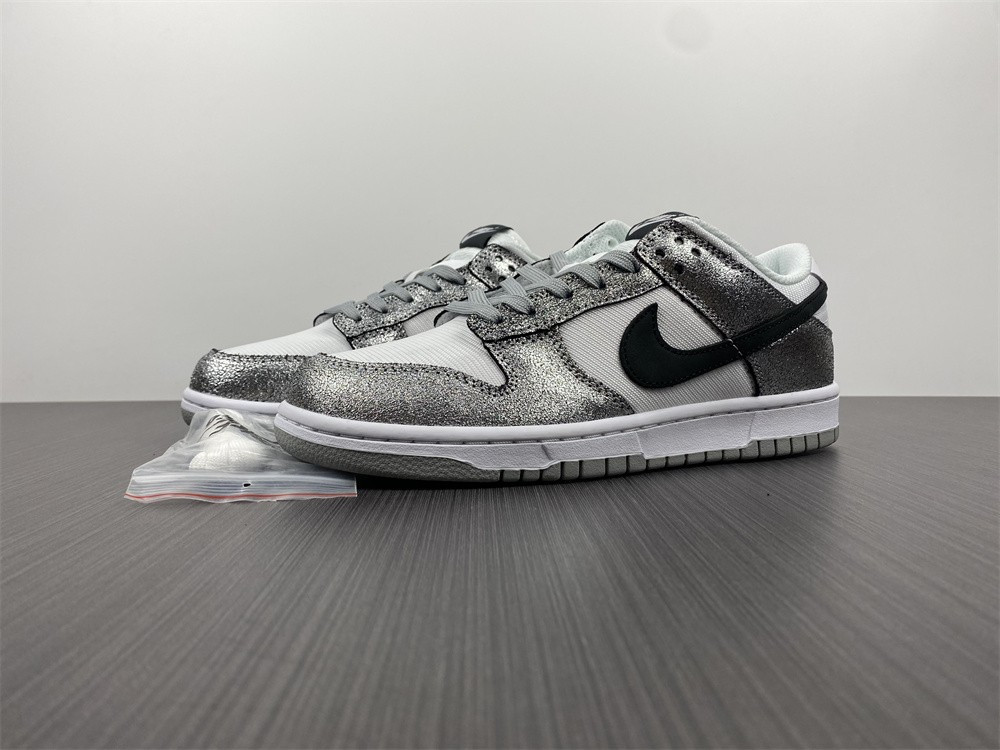 the nike dunk low features silver cracked leather do5882-001