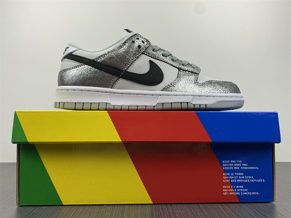 the nike dunk low features silver cracked leather do5882-001
