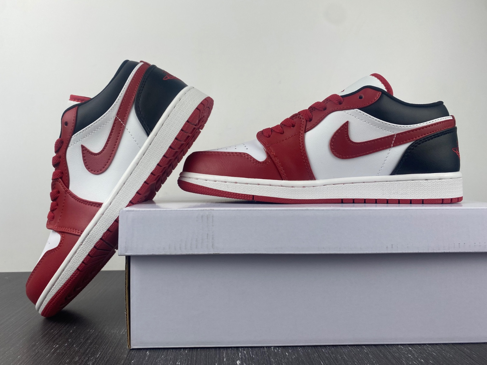 jordan 1 low reverse black toe (women