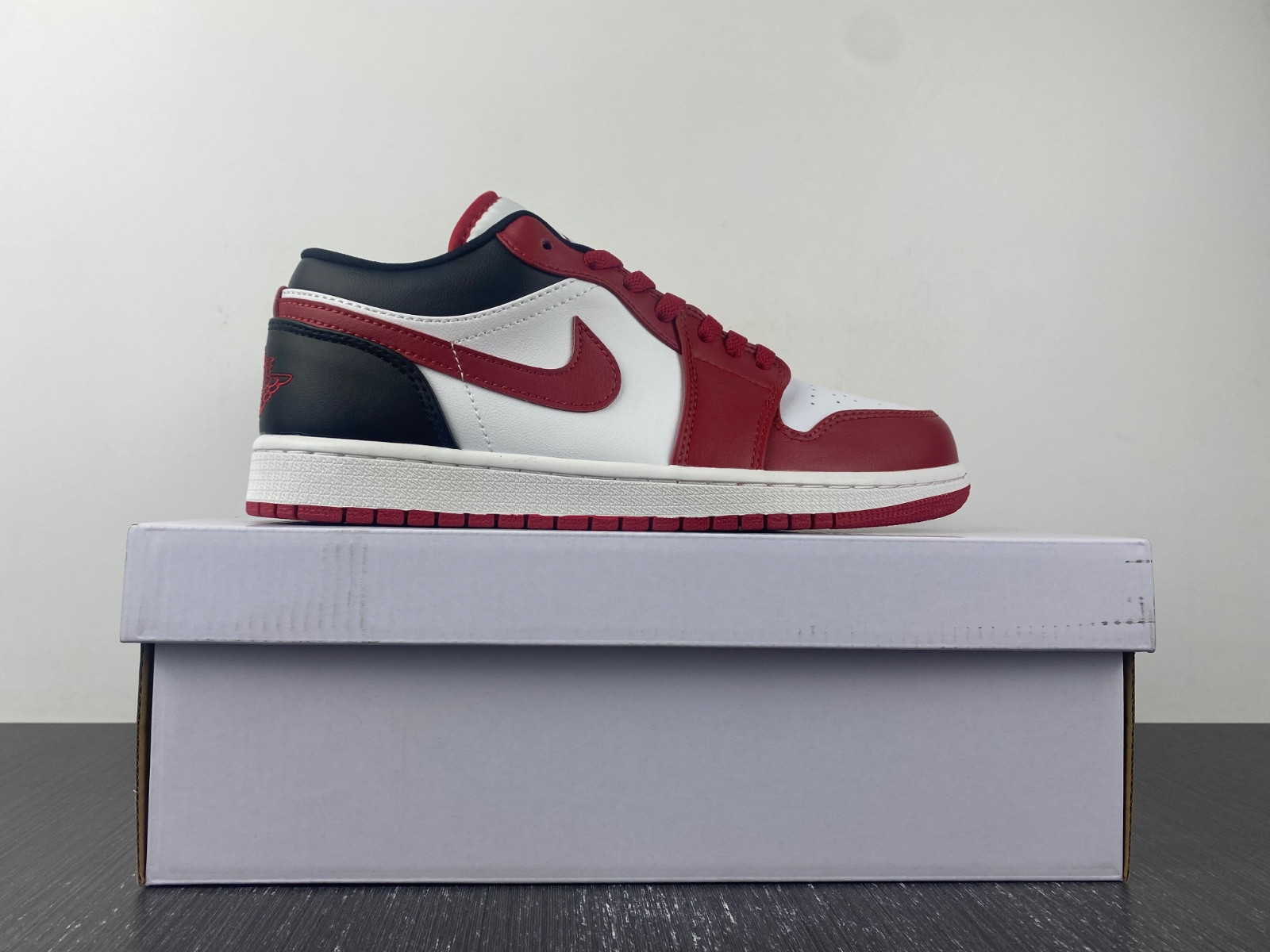 jordan 1 low reverse black toe (women