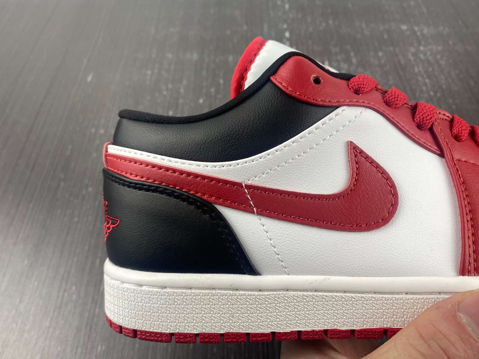 jordan 1 low reverse black toe (women