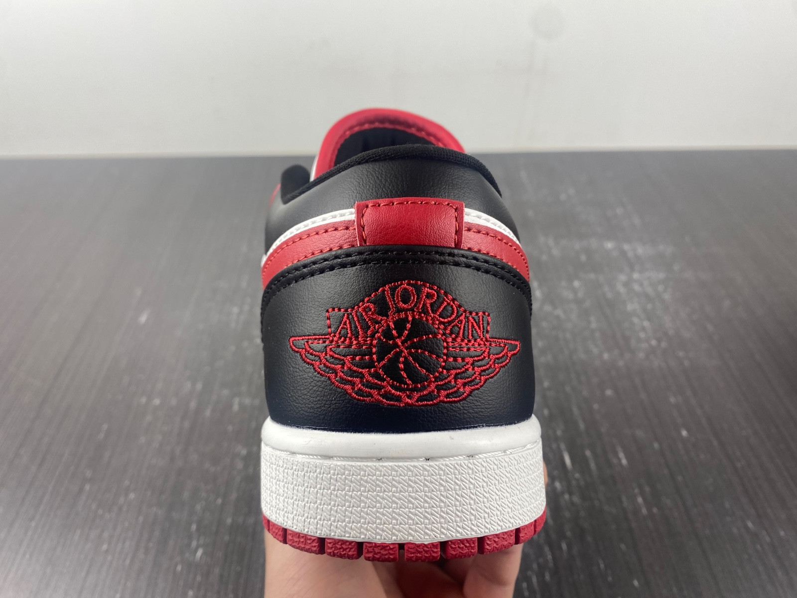 jordan 1 low reverse black toe (women