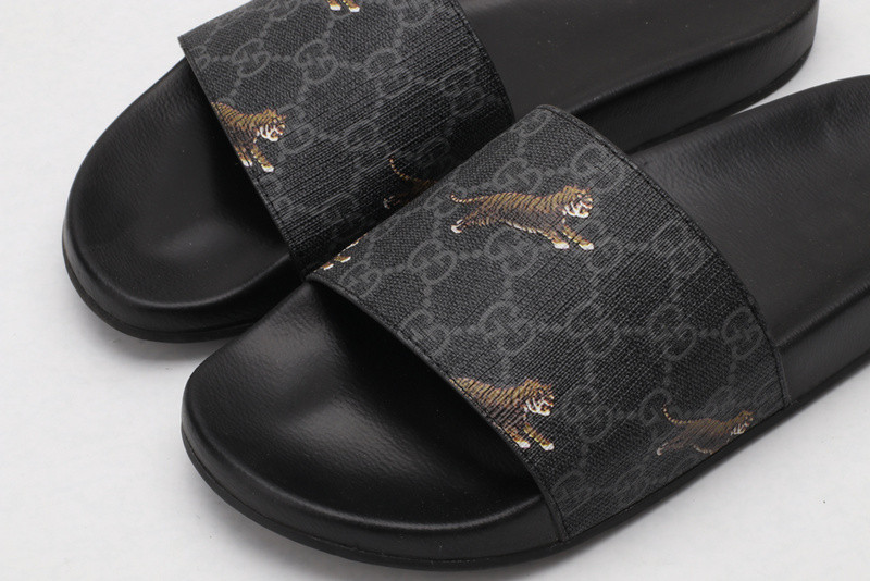 G*u*i slides all black with "tiger"