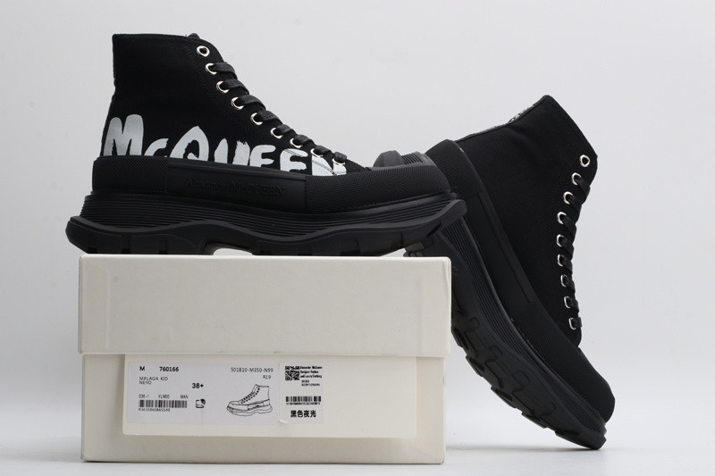 alex mcq tread slick boot in black with letters