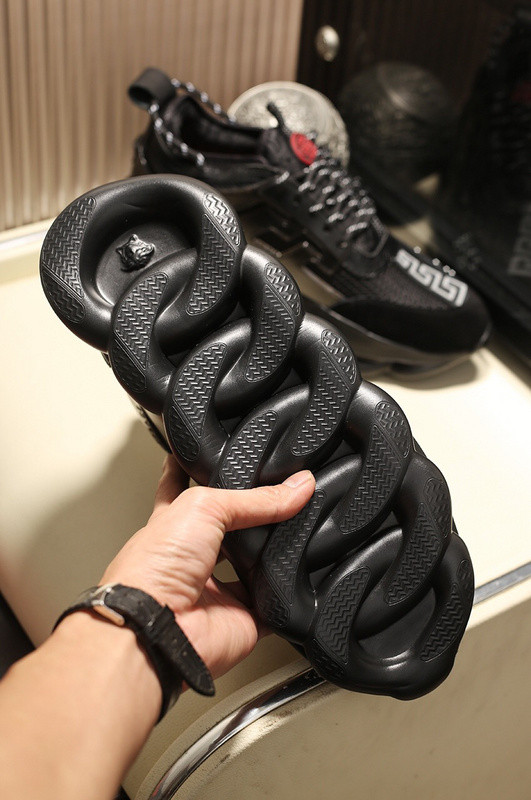versace chain reaction triple black sneakers