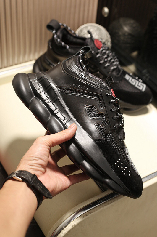 versace chain reaction triple black sneakers