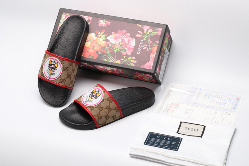 G*u*i slides all black with dog